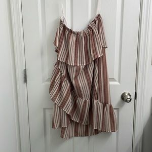 Cute, flouncey sun dress with soft ruffle detailing.